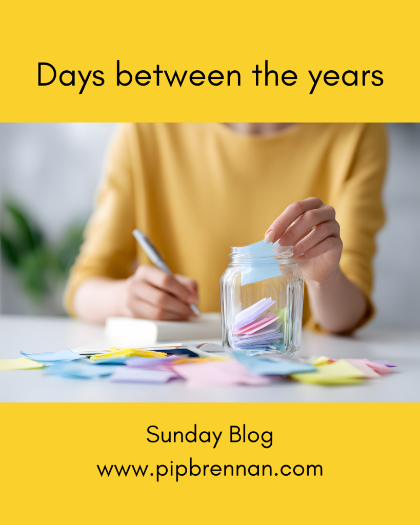 Days between the years - image of a jar where a woman is writing memories on bits of paper and putting them in the jar