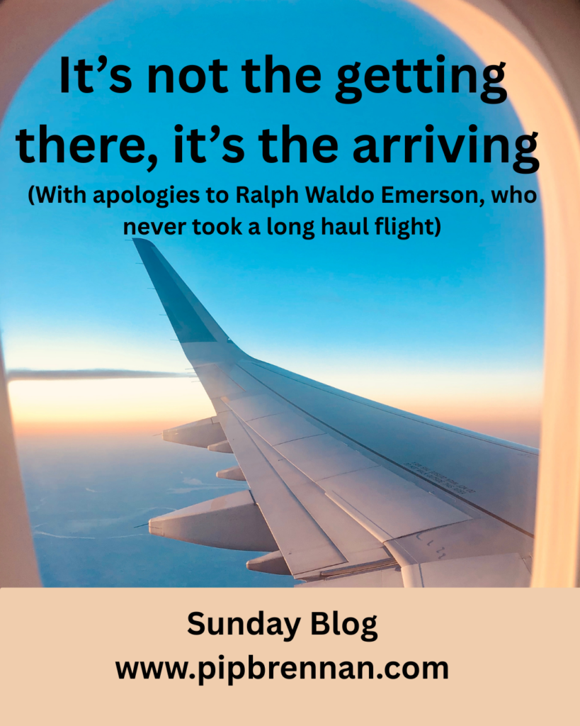 Image looking out of a plane window with the text "It's not the getting there, it's the arriving" With apologies to Ralph Waldo Emerson, who never took a long haul flight